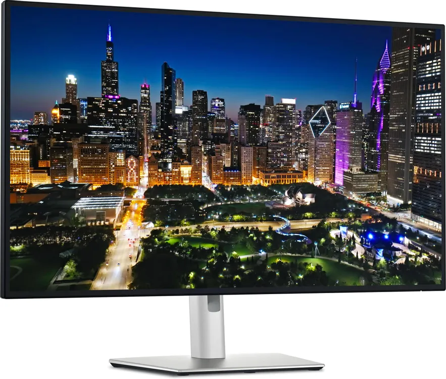 Dell UltraSharp U3225QE экран с высокодетализированным изображением ночного города, демонстрация цветопередачи и контрастности 3000:1